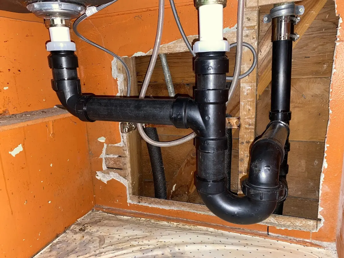 Professional Garbage Disposal Repair equipment and tools on the job in Saukville